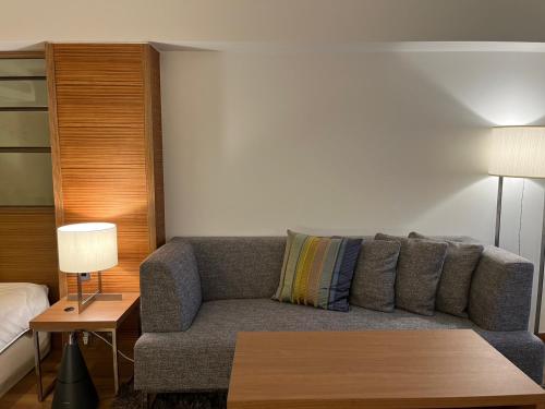 Ein Sitzbereich in der Unterkunft Scapes The Suite