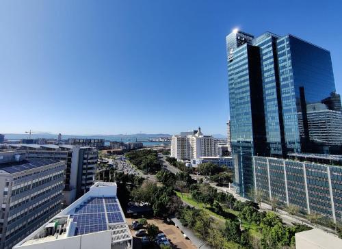 an aerial view of a city with tall buildings at Dockside 1106 in Cape Town