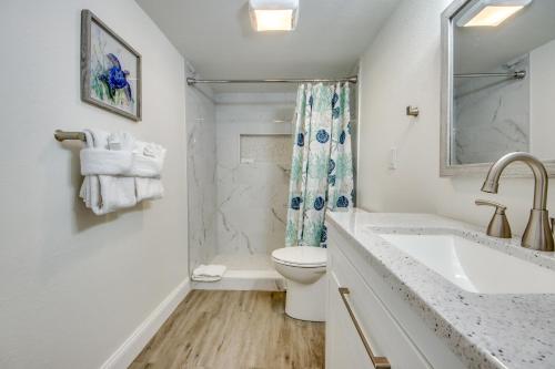 a bathroom with a sink and a toilet at Sand Dollar 1 in Fort Myers Beach