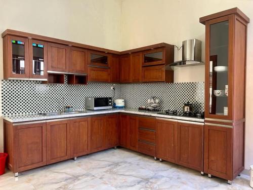 Η κουζίνα ή μικρή κουζίνα στο AW Griya Semilir