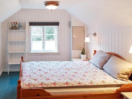 Vuode tai vuoteita majoituspaikassa Holiday home Grimstad