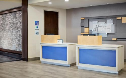 a lobby with two counters with boxes on them at Holiday Inn Express Niagara-On-The-Lake by IHG in Niagara-on-the-Lake