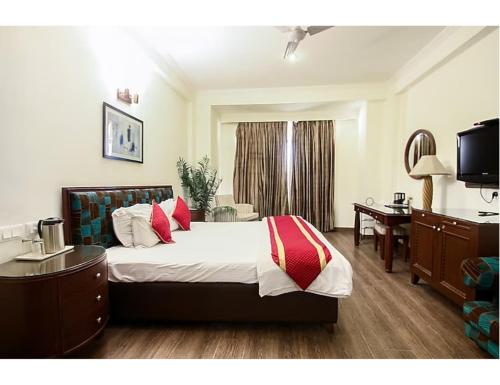 מיטה או מיטות בחדר ב-Jai Maa Inn Hotel, Katra