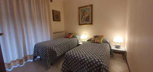 Ένα ή περισσότερα κρεβάτια σε δωμάτιο στο Apartment near the beach