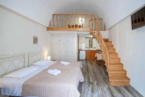 Ένα ή περισσότερα κρεβάτια σε δωμάτιο στο Enjoy Villas