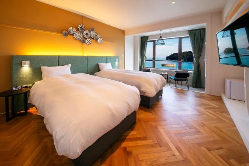 Cama o camas de una habitación en お宿行灯鳥羽