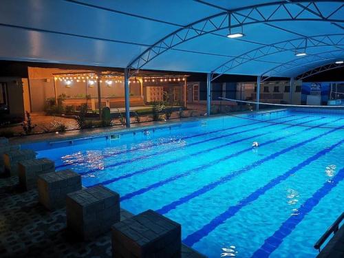 Bazén v ubytování Oasis bahla nebo v jeho okolí