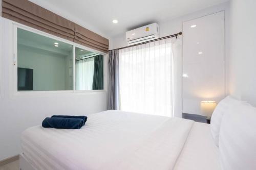 Postel nebo postele na pokoji v ubytování Brand New Patong Apartment 1-Bedroom