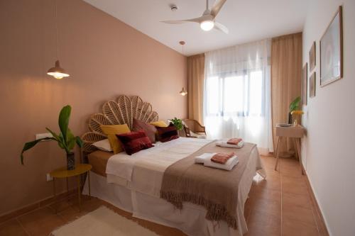 A bed or beds in a room at Book Jet - Costa Calma Sun & Pool