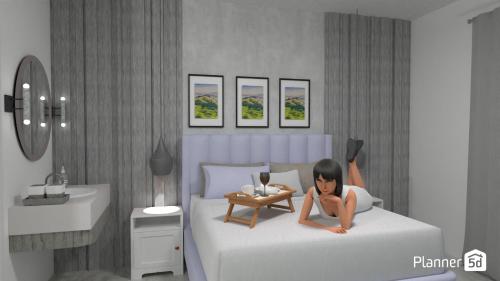Ένα ή περισσότερα κρεβάτια σε δωμάτιο στο Alykes Studios & Suites