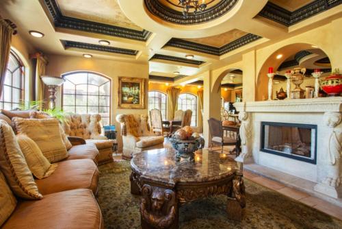 a living room with a couch and a fireplace at Ocean Lodge Resort in Demere Park