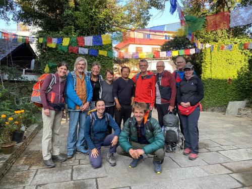 a group of people posing for a picture at Mum's Garden Resort in Pokhara