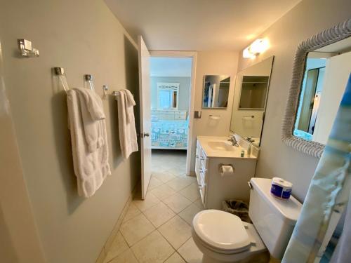 a bathroom with a toilet and a sink at EBT 302b in Fort Myers Beach