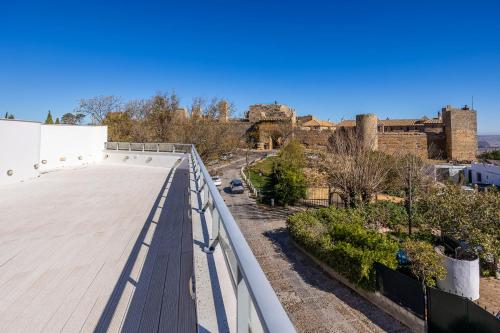 a view from the roof of a building at Casa Xanadu Carmona - Stylish villa with rooftop terrace and stunning views of Parador in Carmona