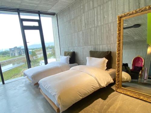 Ein Bett oder Betten in einem Zimmer der Unterkunft Water with Candle Homestay