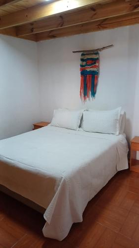 En eller flere senge i et værelse på Lafquen pichilemu