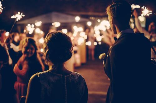 a couple walking down the aisle at a wedding at The Jolly Sportsman in Lewes