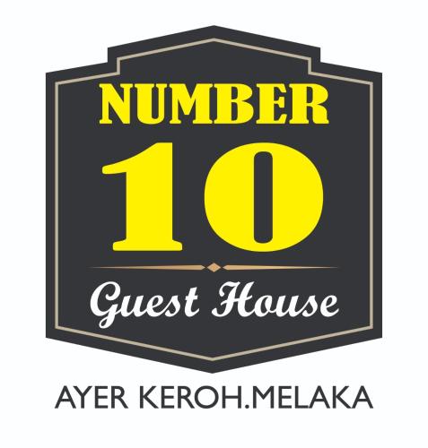 herb z numerem i pensjonat w obiekcie Number Ten Guest House w mieście Ayer Keroh