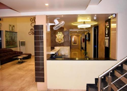 Χώρος καθιστικού στο Hotel Vaishnavi