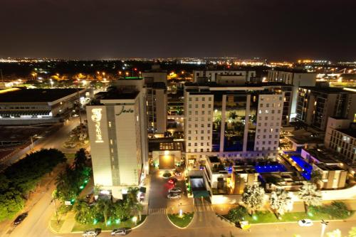 an aerial view of a city at night at Jade Hotel Brasília in Brasilia