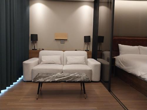 Katil atau katil-katil dalam bilik di The solid residence - Elbon the stay by haeundae
