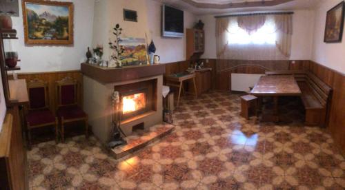 an overhead view of a living room with a fireplace at Beregynia in Zhdenievo