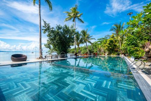 Bazén v ubytování Mai Phuong Resort Phu Quoc nebo v jeho okolí