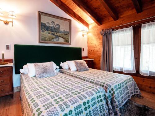 Postel nebo postele na pokoji v ubytování Chalet Chalet Tetras by Interhome