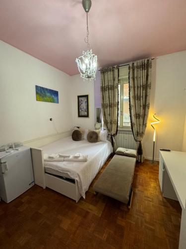 Postel nebo postele na pokoji v ubytování Fenice