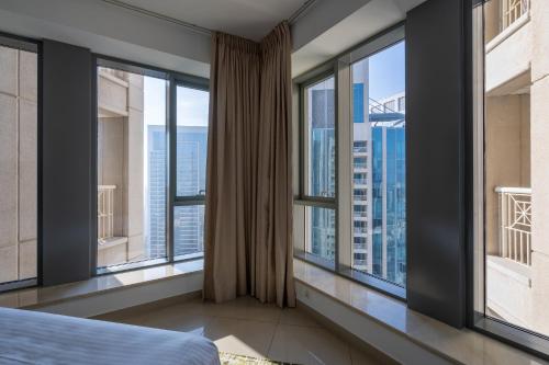 Ένα ή περισσότερα κρεβάτια σε δωμάτιο στο Bellavista - High Floor - 1BR - 29 Boulevard - Full Burj Khalifa & Fountain View