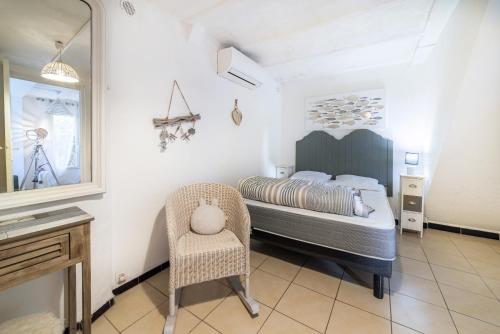 Maison type Canetoise prox plage tesisinde bir odada yatak veya yataklar