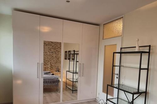 Ένα ή περισσότερα κρεβάτια σε δωμάτιο στο Maberg Ferienwohnung auf Scheid