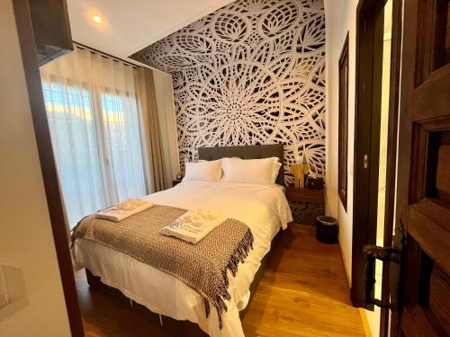 Ένα ή περισσότερα κρεβάτια σε δωμάτιο στο Casón De Los López Apartments