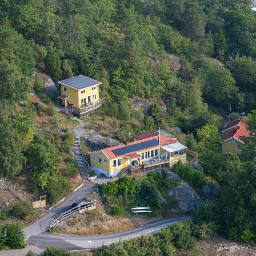 an aerial view of a house on a hill at Riddarhuset in Ljungskile