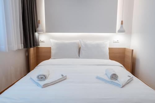 Ένα ή περισσότερα κρεβάτια σε δωμάτιο στο Aparthotel Zlatni Javor