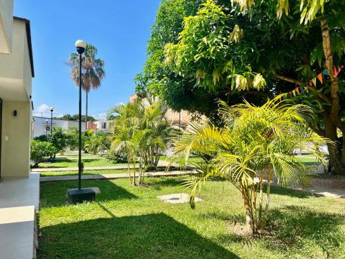 Jardín al aire libre en Hotel TACALOA INN EXPERIENCE