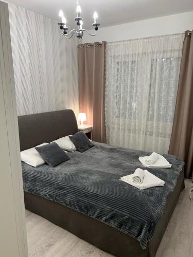Posteľ alebo postele v izbe v ubytovaní Apartament Lawendowy