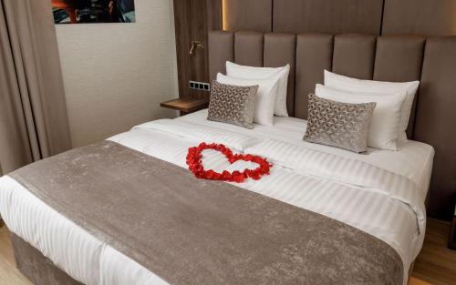 Postel nebo postele na pokoji v ubytování Anna Grand Hotel