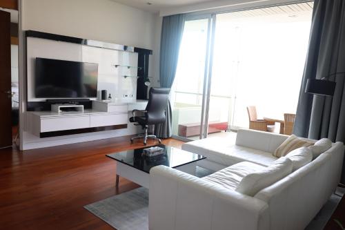 Μια τηλεόραση ή/και κέντρο ψυχαγωγίας στο Premium Oceanview Condominium