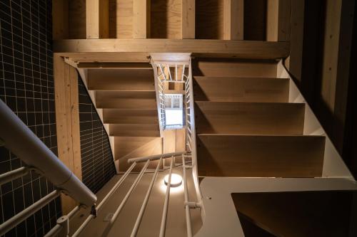 a staircase in a building with a light on it at Apartamentos Vilafamés Antic Palau in Vilafames