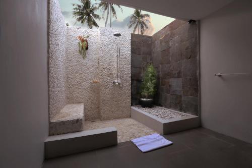 Ванная комната в Living Asia Resort and Spa