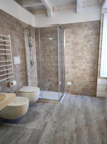 Ένα μπάνιο στο IL PLEBISCITO luxury loft fronte Basilica