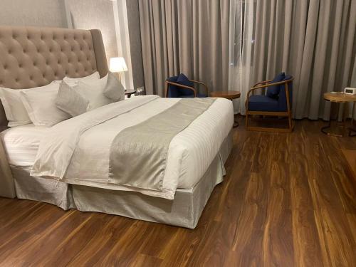 מיטה או מיטות בחדר ב-سكوب العربية