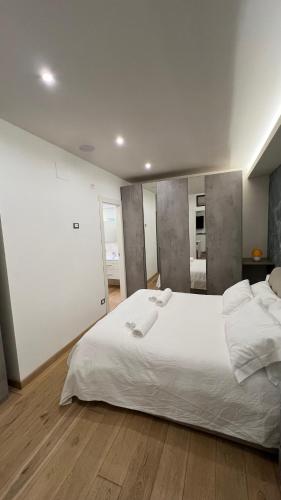 Katil atau katil-katil dalam bilik di Loft San Leopardo