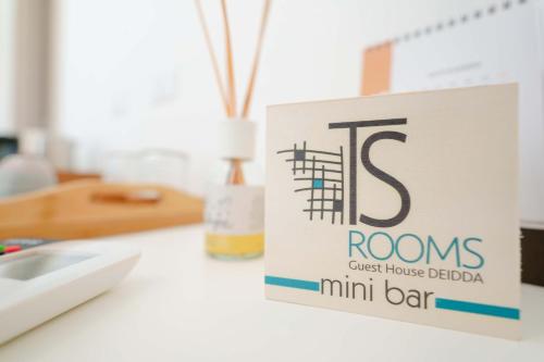 a box sitting on a white counter top with access at Guest House Deidda - TS ROOMS B&B in San Sperate