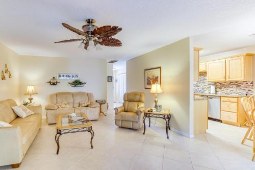 a living room with a couch and chairs and a ceiling fan at Sebastian Home with Screened Lanai 8 Mi to Beach! in Sebastian