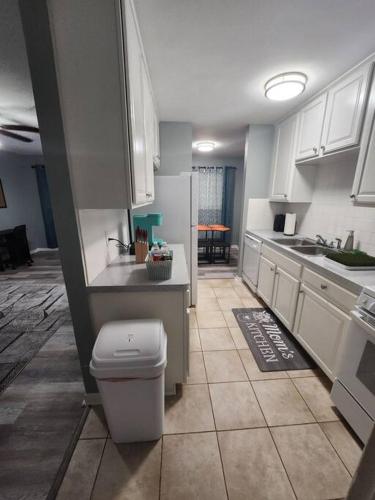 a kitchen with a sink and a toilet in it at Blue Shark *B2* @ Bellaire 1BR King Apartment Near Medical Center in Houston