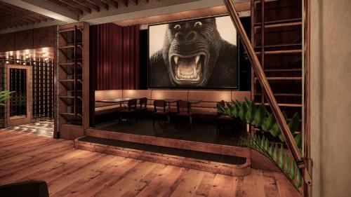 a restaurant with a picture of a gorilla on the wall at Motto By Hilton Bentonville Downtown in Bentonville