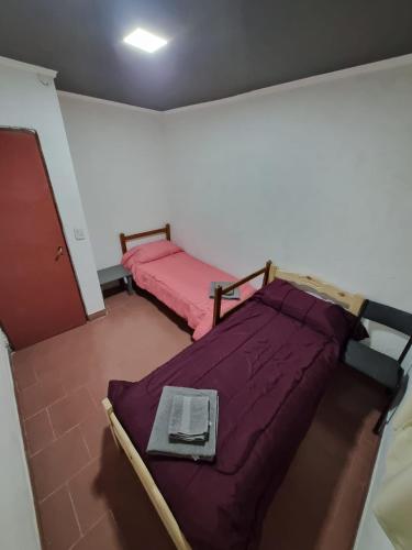 En eller flere senge i et værelse på Unkai Bariloche