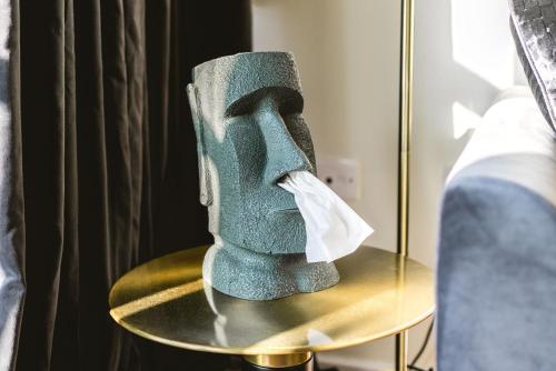 a sock sitting on top of a table at Canary Wharf 2-Bed Luxury Haven in London